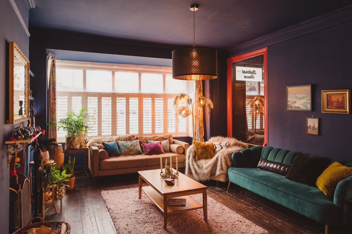 Ballarat House- The spacious living area with two large sofas, armchair and rocking chair